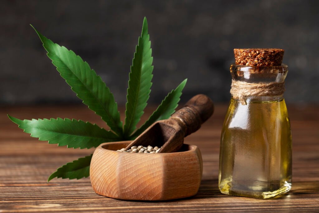 CBD oil and leaves arrangement